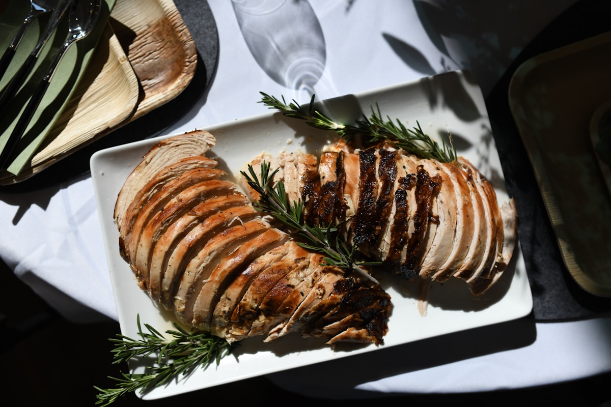 cooked fish on white ceramic plate